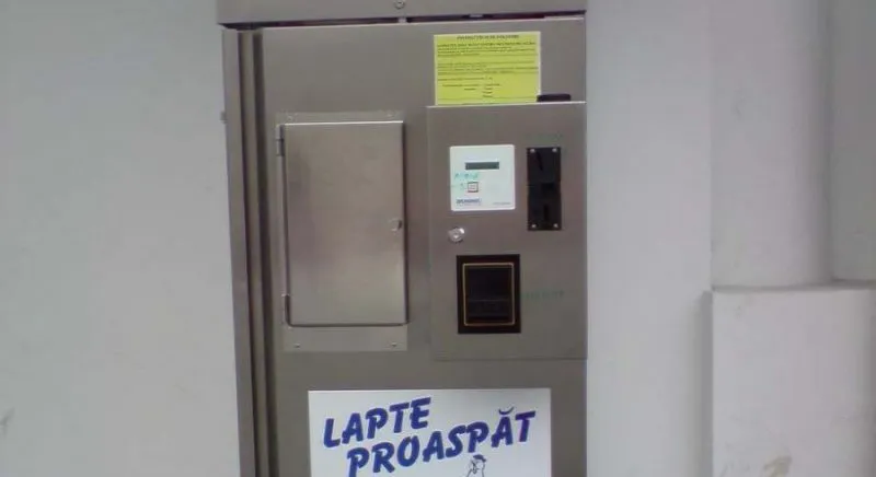 Un bărbat a sustras bani dintr-un dozator de lapte