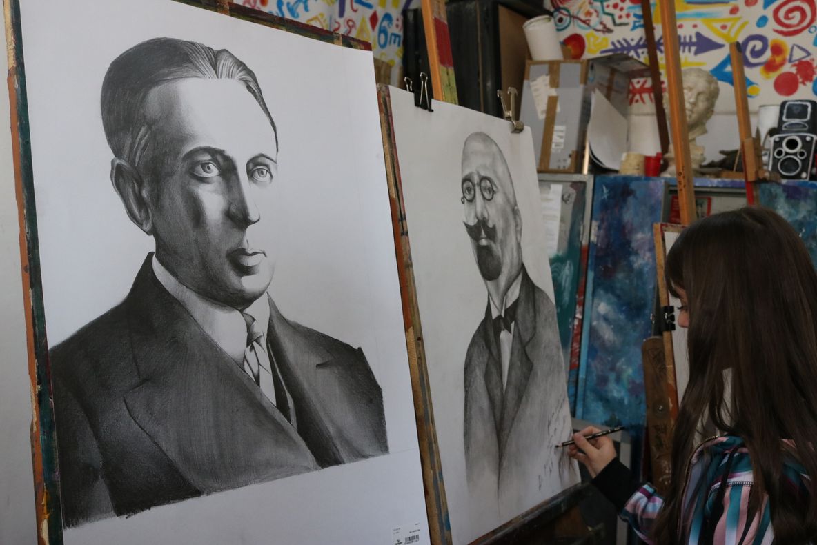 100 de chipuri ale Unirii din 1918