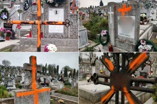 Profanare de morminte în cimitirul din Alba Iulia. Cruci vopsite strident pentru că nu s-au plătit taxele